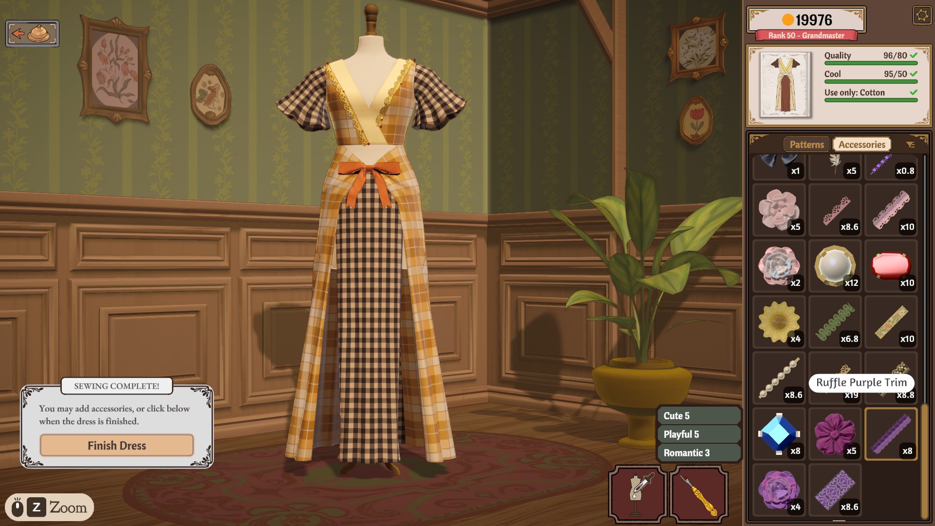 A plaid cotton dress on a mannequin with Quality 96/80 and Cool 95/50 green under a Use only: Cotton rule