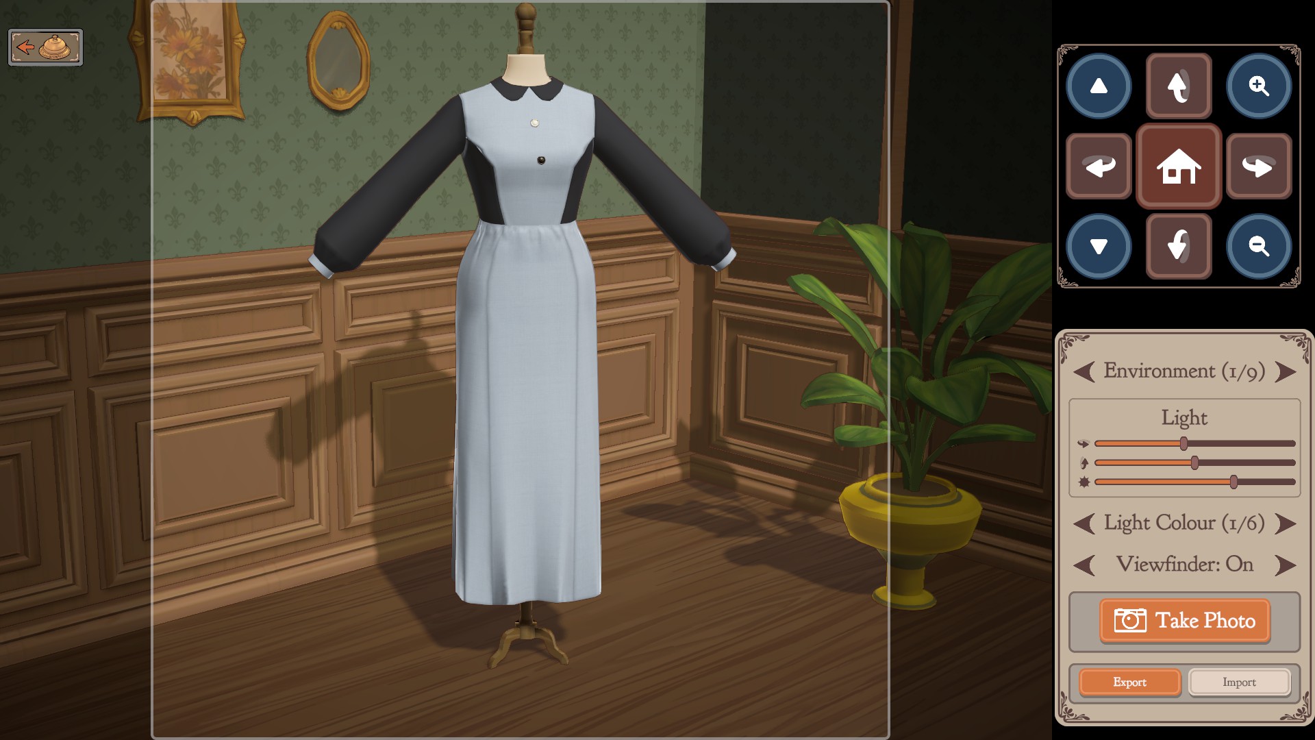 A grey long skirt and princess bodice with a dark collar and dark peasant sleeves, photographed on a mannequin