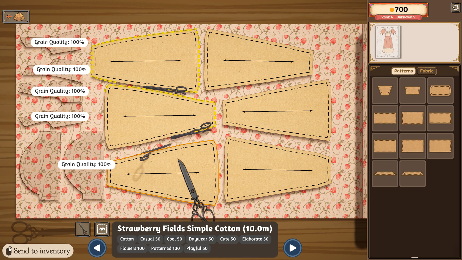 Dressmaker cutting table with pattern pieces, direction arrows and visible Grain Quality feedback